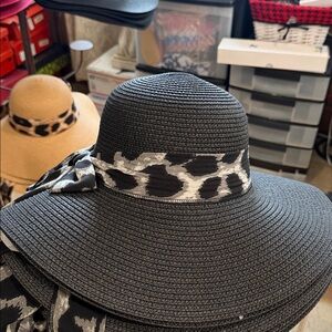 Elegant Black Wide-Brim Hat with Patterned Band